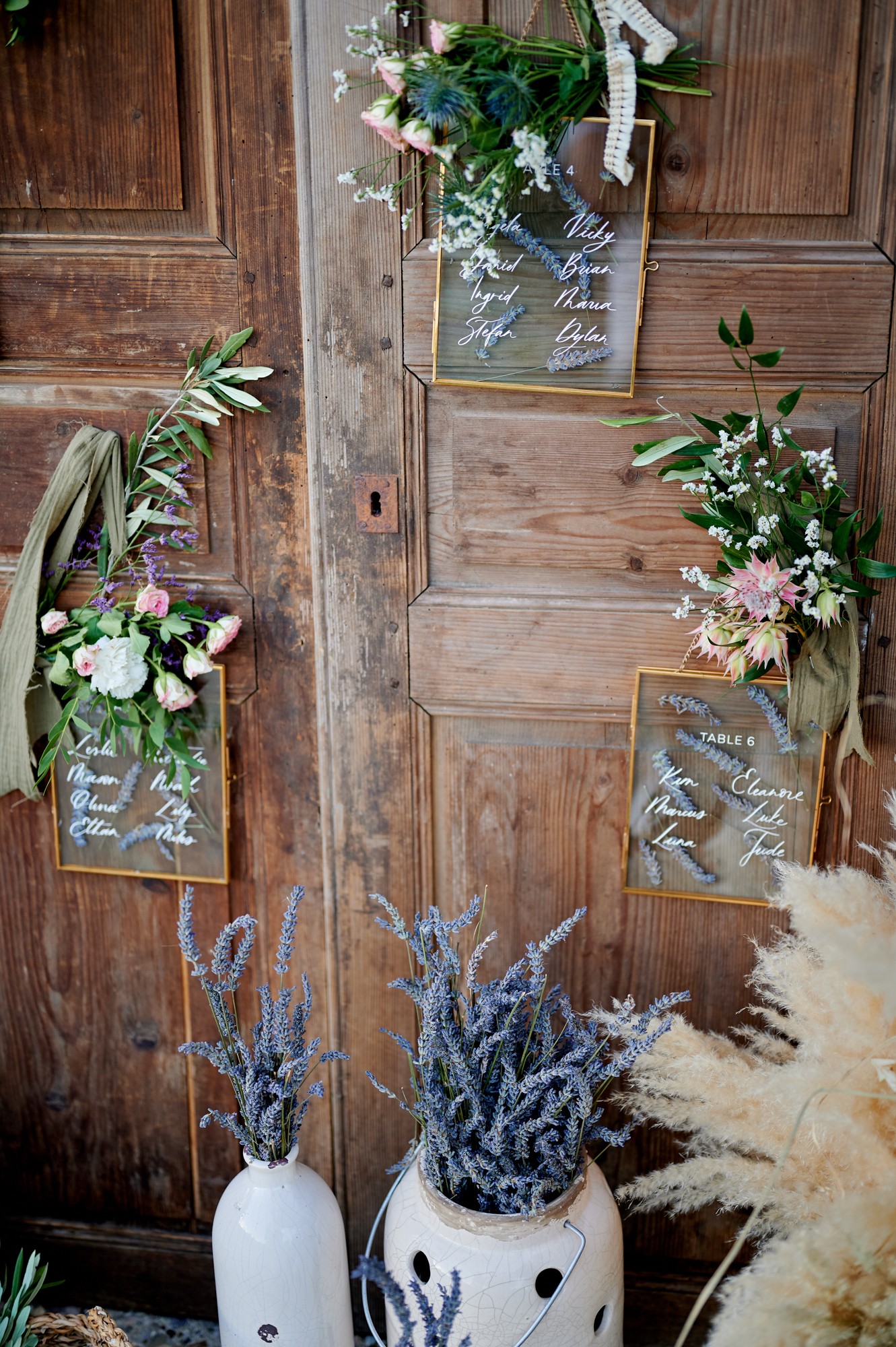 A dried flower rested upon wrinkled pieces of cloth paper.